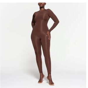 Skims Swarovski jelly sheer fully length cat suit.